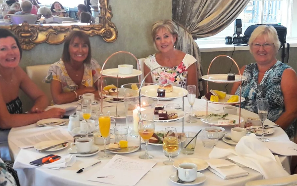 Culture Calendar Women’s Social Group enjoying a glamorous murder mystery afternoon tea with cocktails, live entertainment, and plenty of laughs at a ladies’ event in Merseyside and West Lancashire.