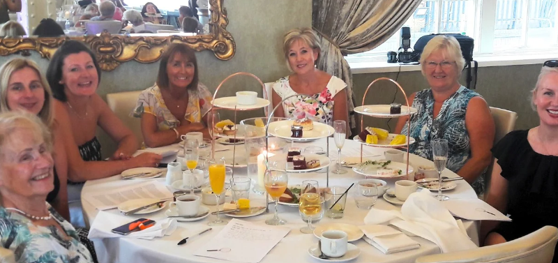 Culture Calendar Women’s Social Group enjoying a glamorous murder mystery afternoon tea with cocktails, live entertainment, and plenty of laughs at a ladies’ event in Merseyside and West Lancashire.