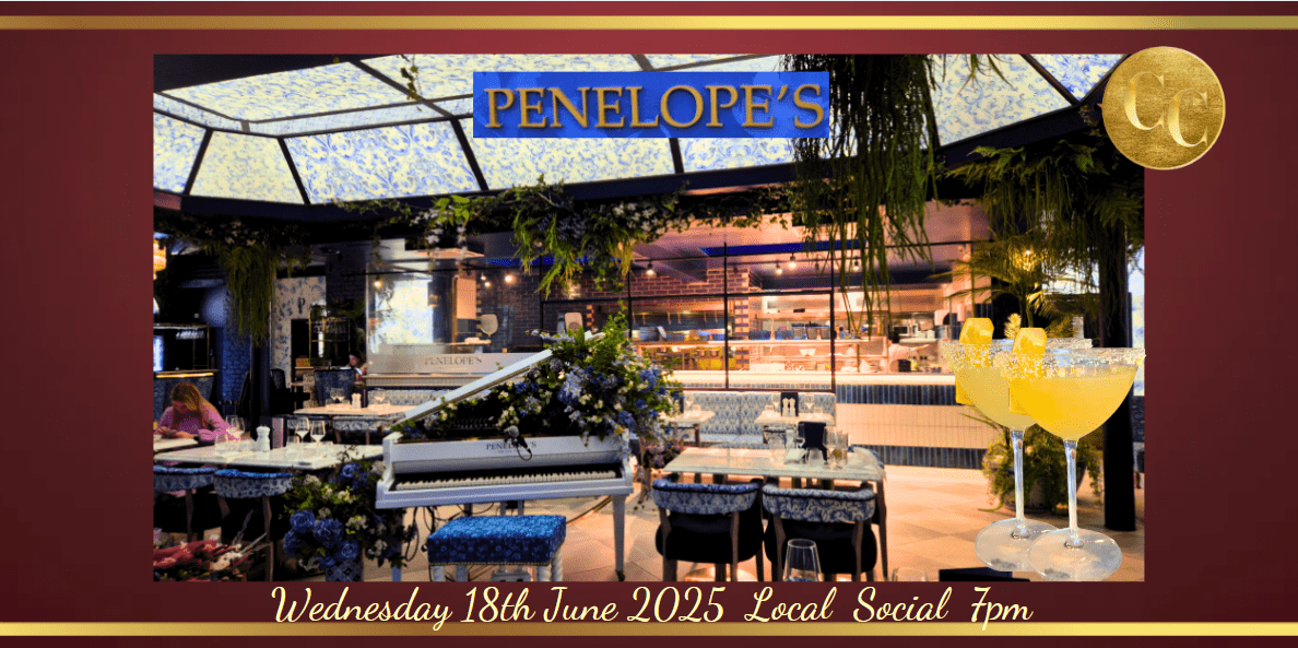 A cozy, warmly lit restaurant with elegant wooden tables, stylish décor, and a welcoming atmosphere—perfect for great conversations and delicious meals
