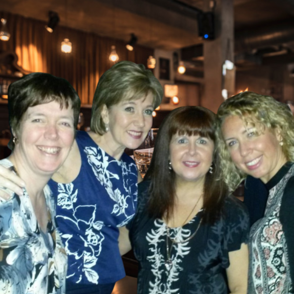 Smiling women enjoying a Culture Calendar theatre trip — part of a women’s social group in Merseyside and West Lancashire that began as a simple post and grew into a cultural community for women over 40