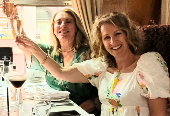 Culture Calendar women toasting friendship and shared cultural adventures in Merseyside and West Lancashire.