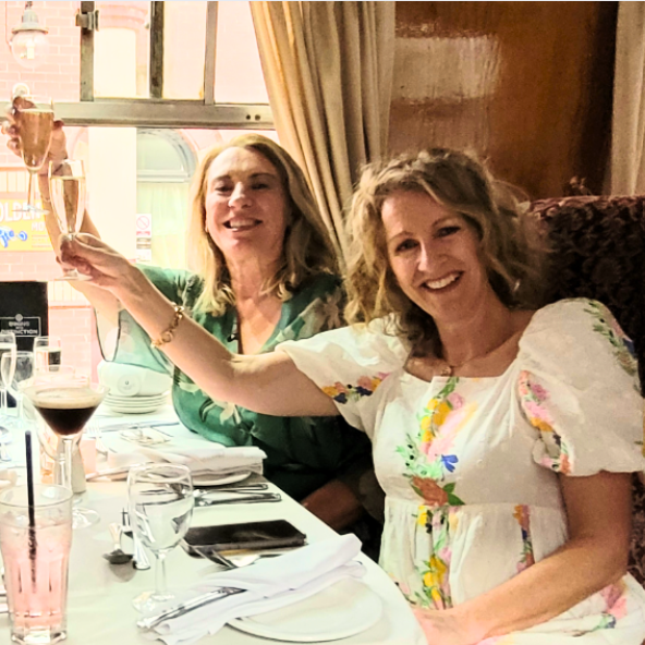 Culture Calendar women toasting friendship and shared cultural adventures in Merseyside and West Lancashire.