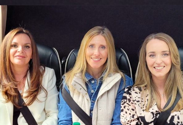 Smiling women from Culture Calendar Women’s Social Group enjoying a luxury coach trip to The Cher Show at The Palace Theatre Manchester — a stylish, fun-filled day of live entertainment, culture, and friendship.