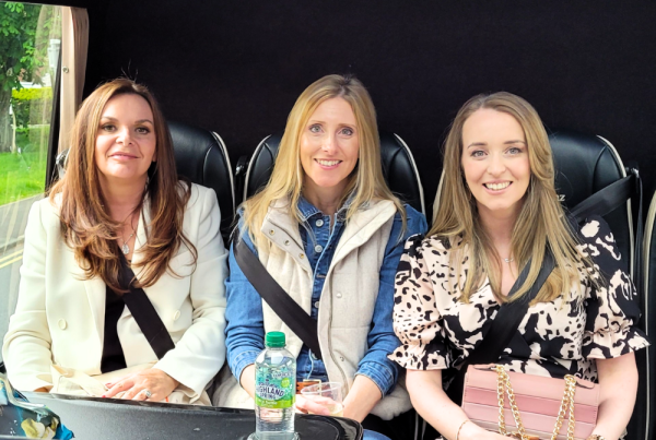 Three Culture Calendar ladies enjoying cocktails on a luxury coach trip to see Cher The Show, making friends and sharing a fabulous cultural night out.